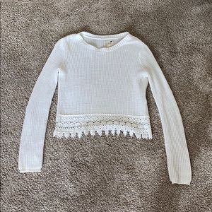 White embroidered hem sweater